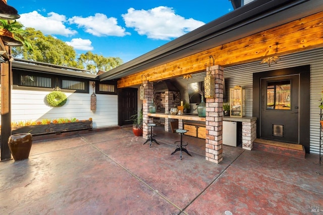 view of patio featuring exterior kitchen