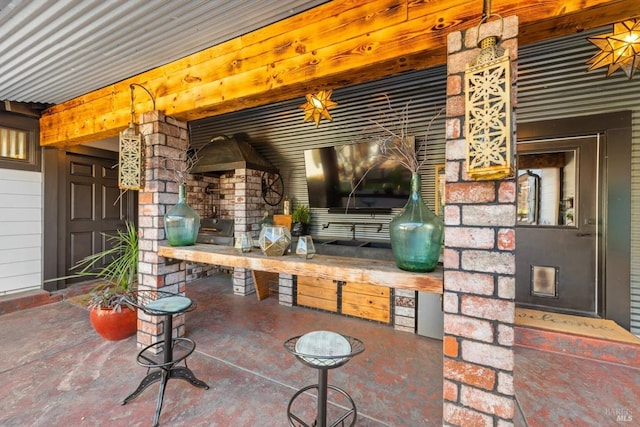 view of patio with an outdoor kitchen