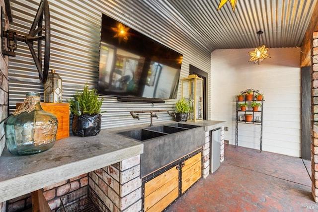 view of patio featuring a sink and area for grilling