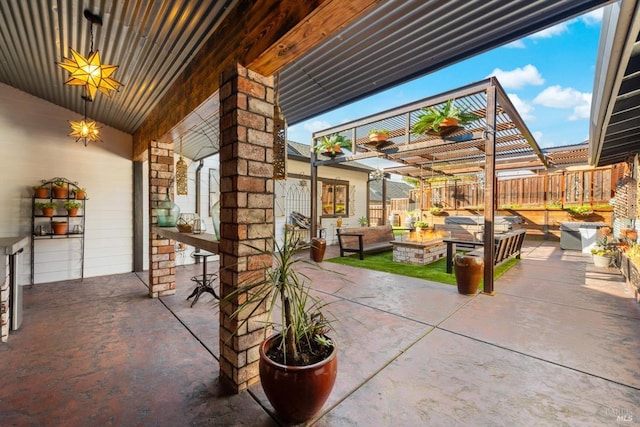 view of patio / terrace with fence, an outdoor living space, and a pergola