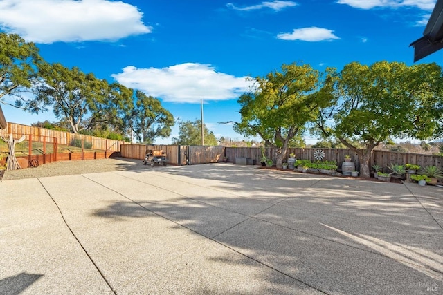 exterior space featuring a fenced backyard