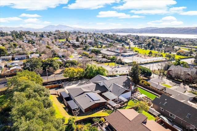 drone / aerial view with a residential view and a mountain view