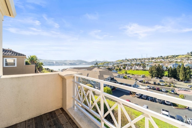 balcony featuring a water view