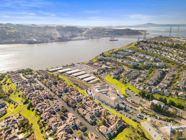 aerial view with a residential view and a water and mountain view