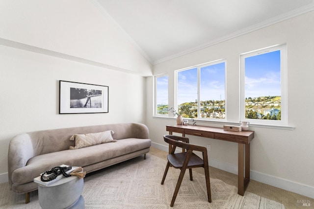 home office featuring lofted ceiling, baseboards, ornamental molding, and light colored carpet