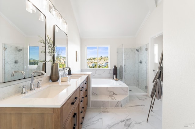 bathroom featuring crown molding, vaulted ceiling, a garden tub, and a sink