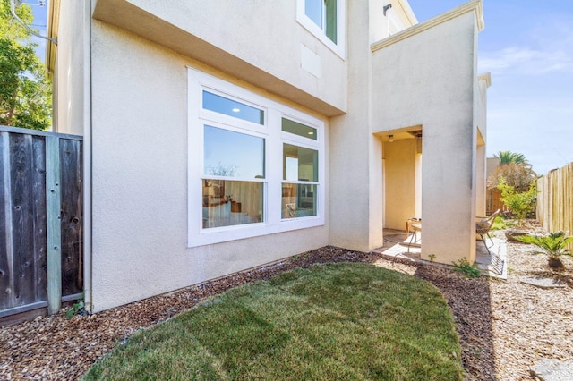 view of home's exterior featuring a fenced backyard and stucco siding