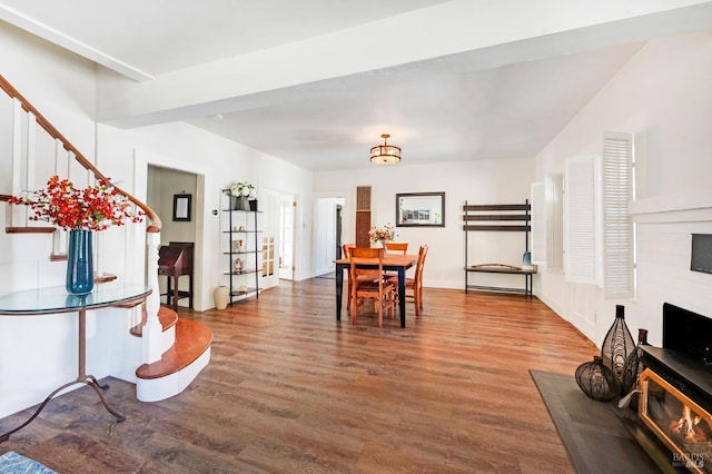 dining space with wood-type flooring