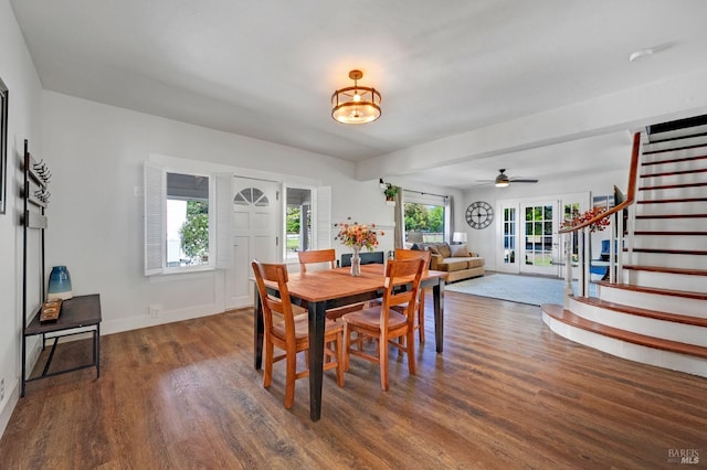 dining room with ceiling fan and dark hardwood / wood-style flooring