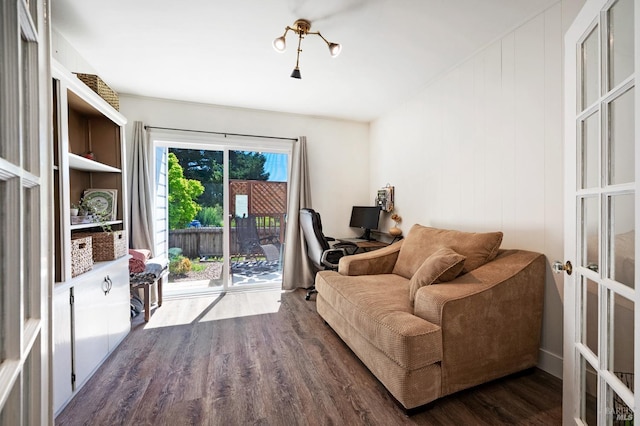 sitting room with dark hardwood / wood-style floors and french doors