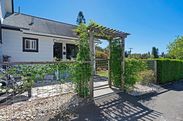 exterior space with a pergola