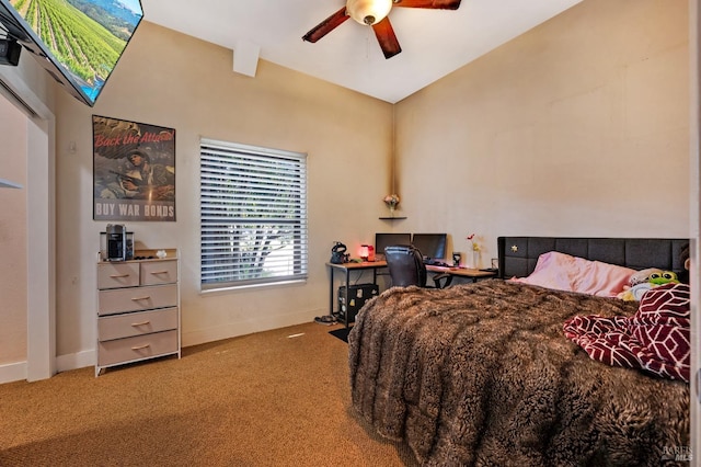 bedroom featuring ceiling fan and carpet