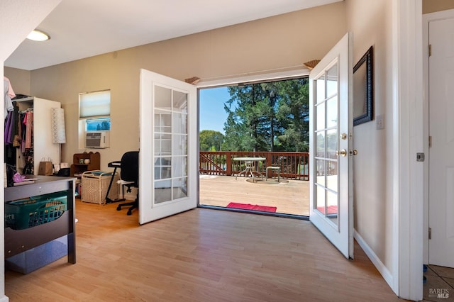 doorway to outside with light wood-type flooring and french doors