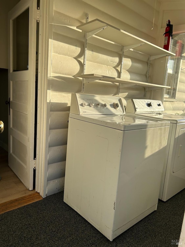 laundry room featuring washer and clothes dryer