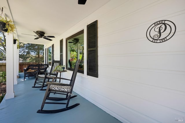 view of patio featuring ceiling fan and covered porch