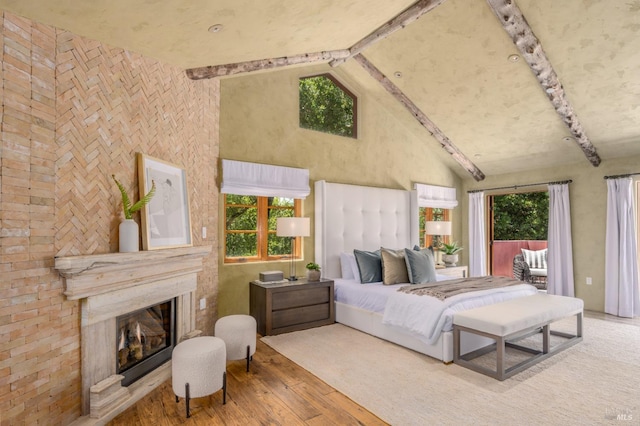 35 Forest Ln, Napa, CA 94558 - bedroom featuring wood-type flooring, multiple windows, high vaulted ceiling, and access to outside