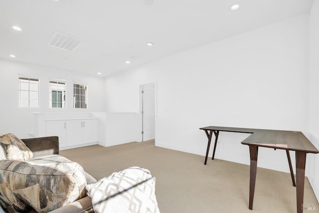 living room with light colored carpet