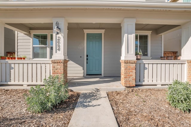 entrance to property with covered porch