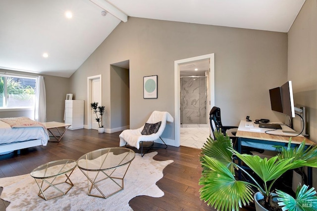 bedroom with vaulted ceiling with beams, ensuite bath, and dark wood-type flooring