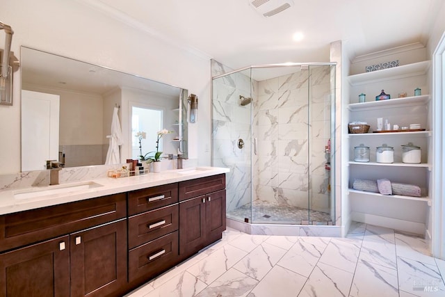 bathroom with vanity, crown molding, and walk in shower