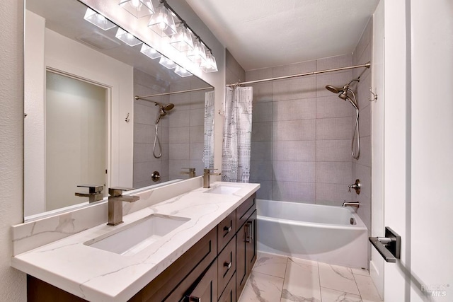 bathroom featuring vanity and shower / bath combo with shower curtain