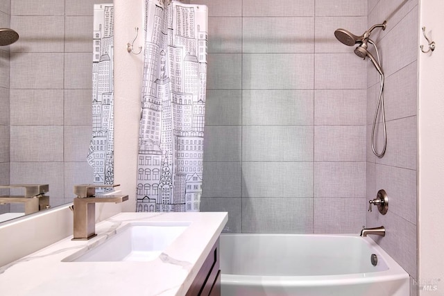 bathroom featuring shower / tub combo with curtain and vanity