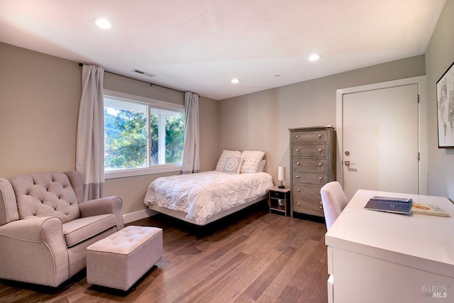 bedroom featuring hardwood / wood-style floors