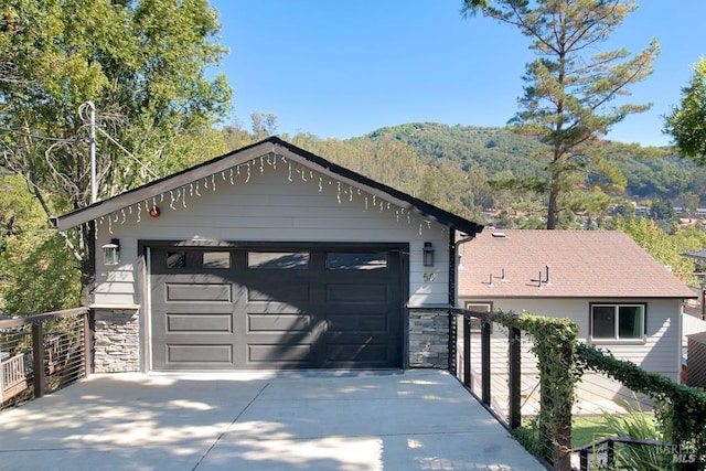 garage featuring a mountain view