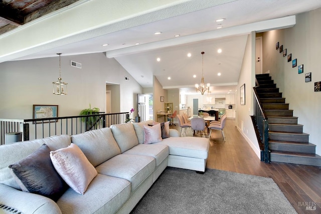 living room featuring an inviting chandelier, dark wood-type flooring, high vaulted ceiling, and beamed ceiling