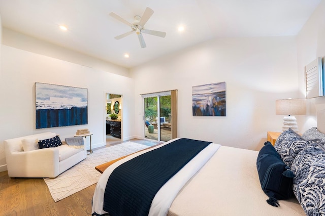 bedroom featuring vaulted ceiling, ceiling fan, access to exterior, and light hardwood / wood-style floors