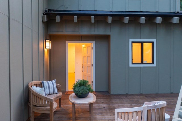 entrance to property with a wooden deck