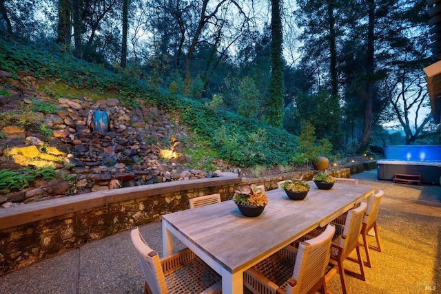 view of patio featuring a hot tub