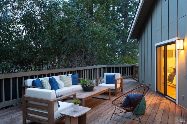 wooden deck featuring outdoor lounge area