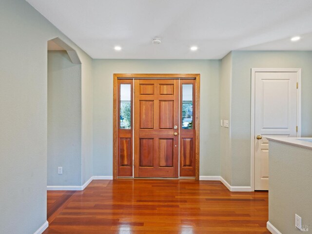 corridor with light wood-type flooring