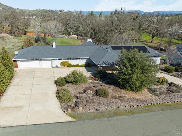 view of exterior entry with solar panels