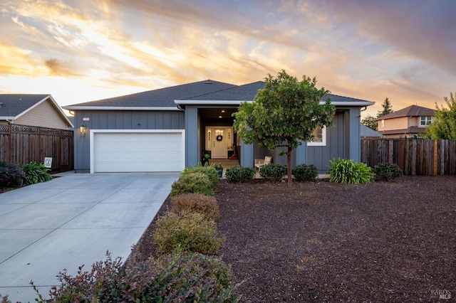 view of front of property featuring a garage