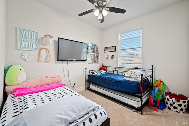 bedroom with ceiling fan and carpet flooring