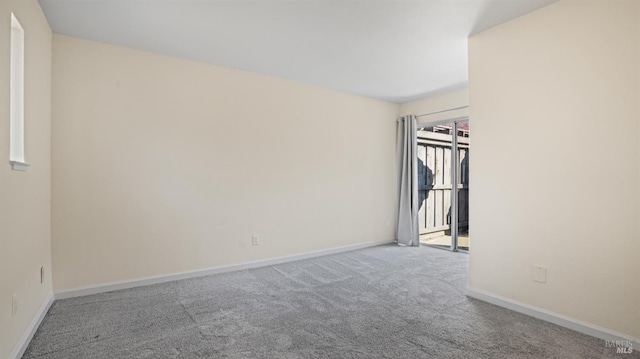 empty room featuring carpet flooring