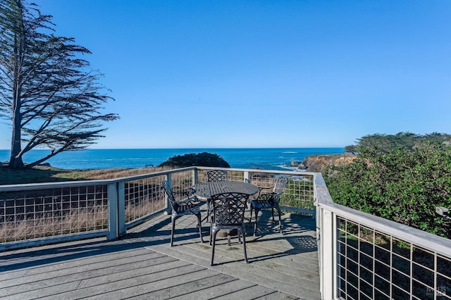 wooden terrace with a water view