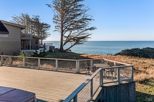 deck featuring a water view