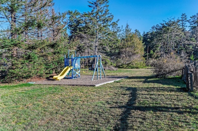 view of play area with a yard