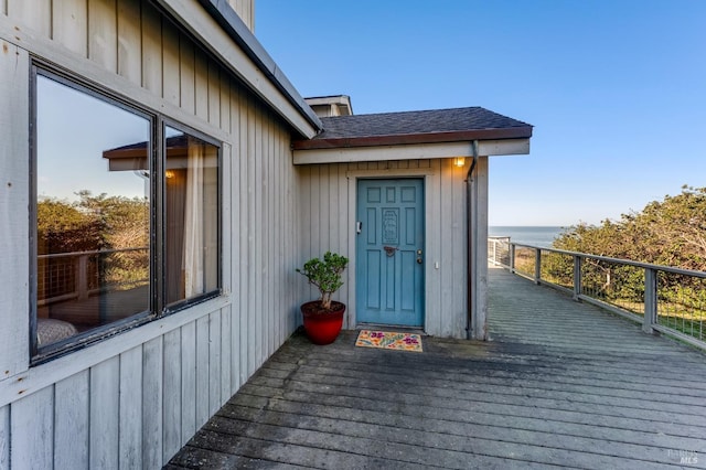 property entrance with a water view