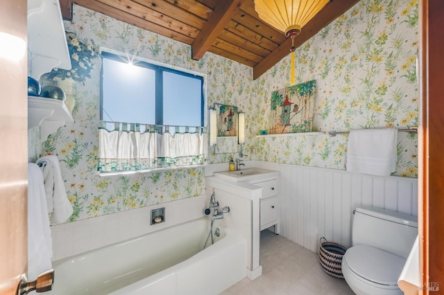 bathroom featuring wood ceiling, vanity, toilet, a tub to relax in, and lofted ceiling with beams