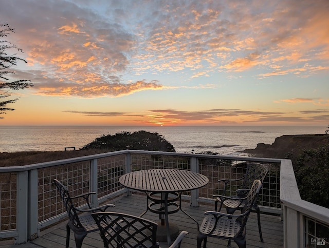 deck at dusk with a water view