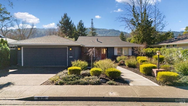 ranch-style home with a garage