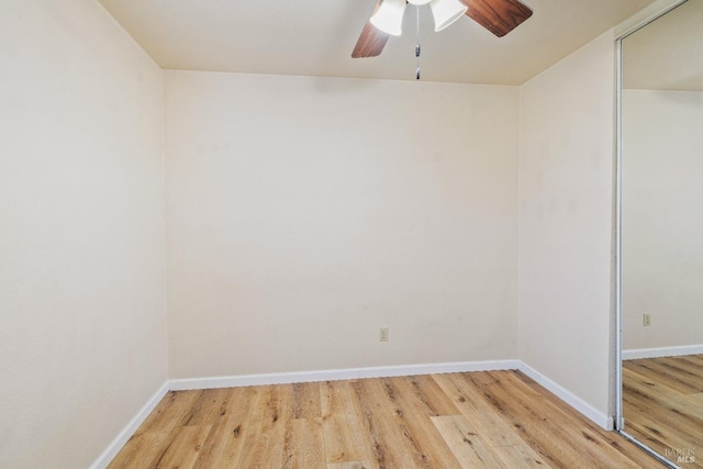 spare room featuring ceiling fan and wood-type flooring