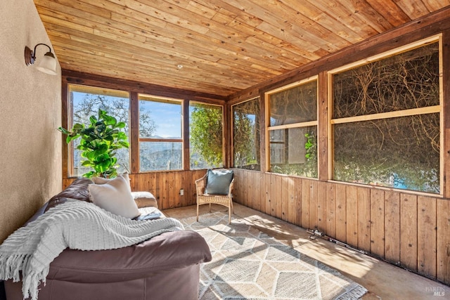 sunroom / solarium featuring wood ceiling