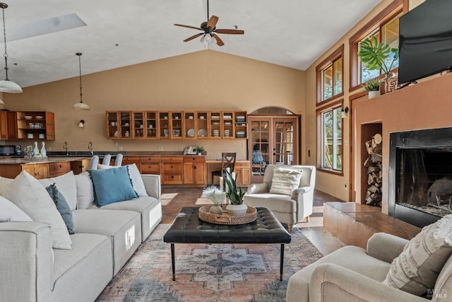 living room featuring vaulted ceiling