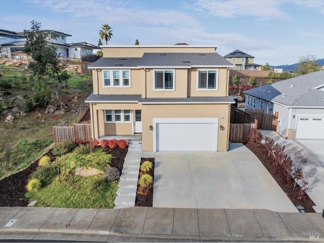 view of front of property featuring a garage