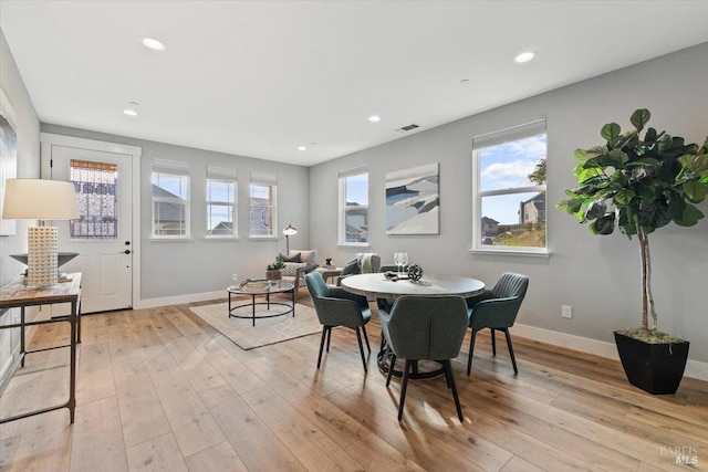 dining room with light wood-type flooring